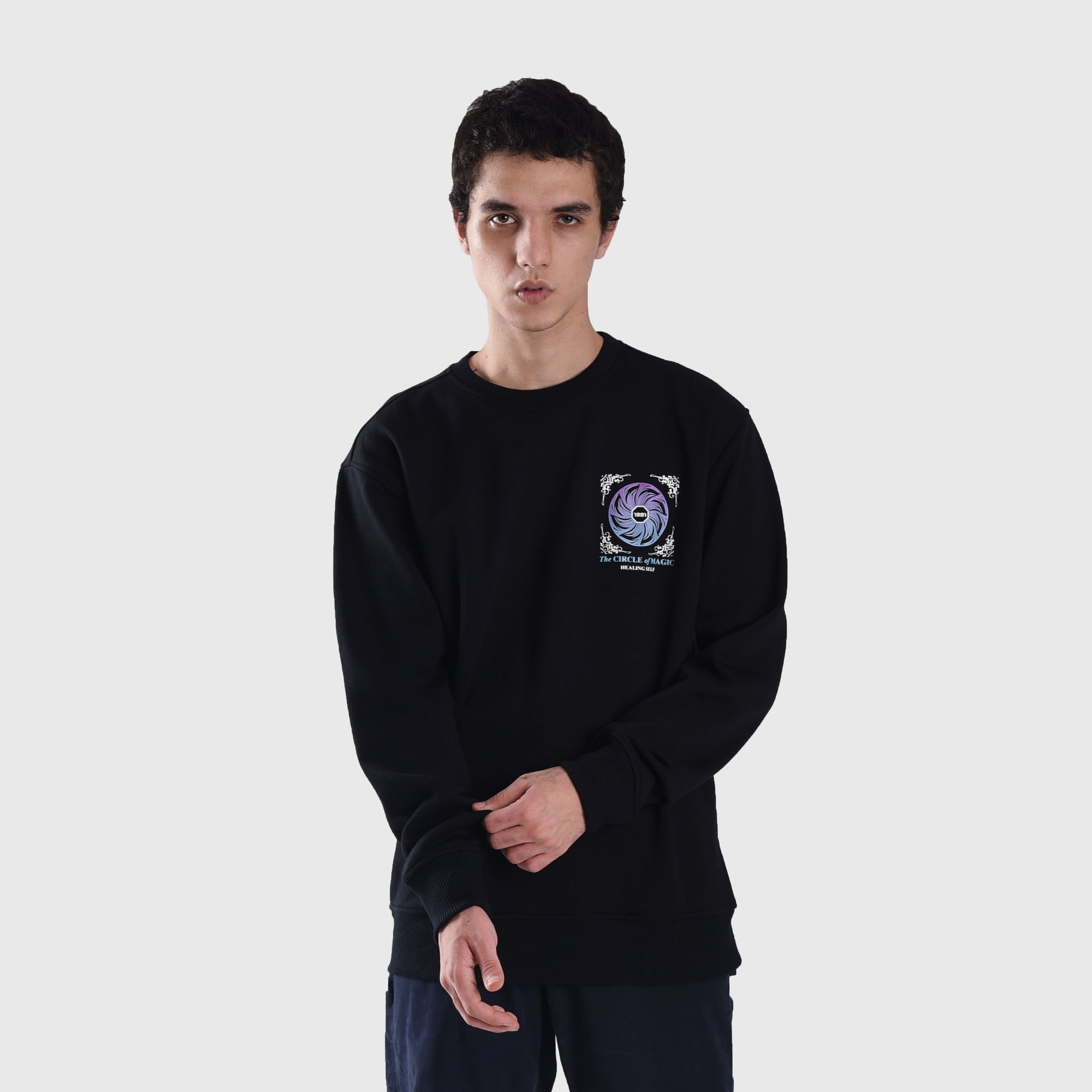 SS372 Circle Of Magic Black Crewneck